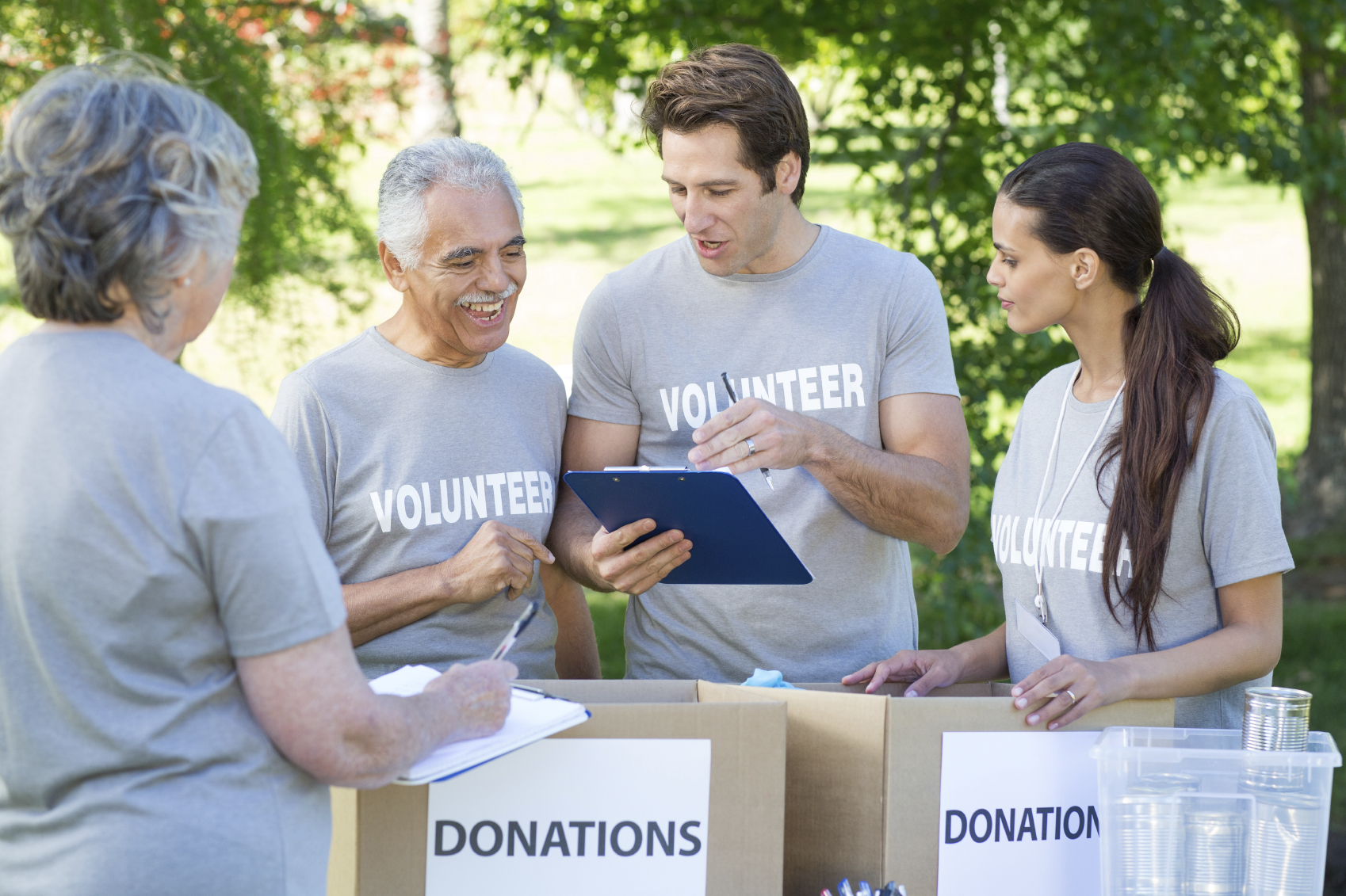 Group of volunteers reviewing donations